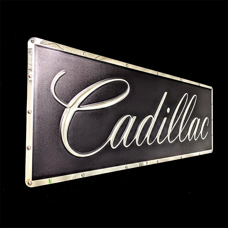 embossed mirror polished stainless steel sign Cadillac script side view