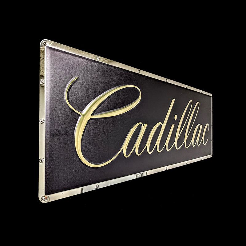 embossed mirror polished stainless steel sign Cadillac script side view