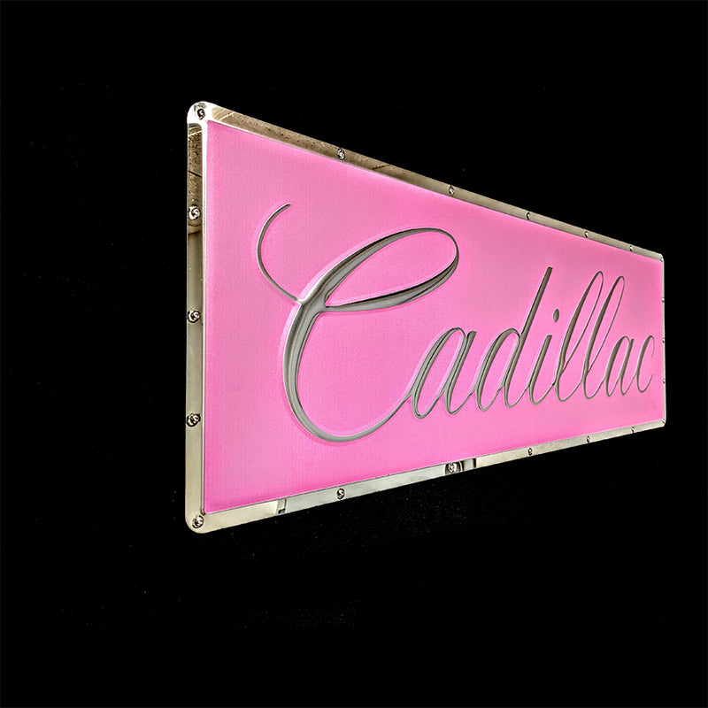 embossed mirror polished stainless steel sign Cadillac script side view