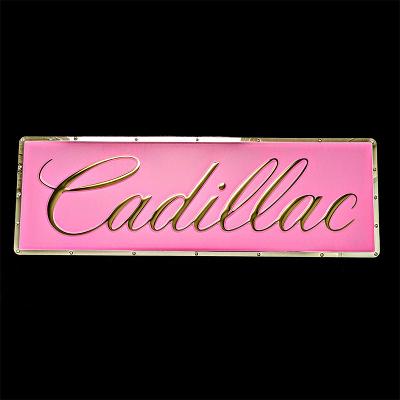 embossed mirror polished stainless steel sign Cadillac script
