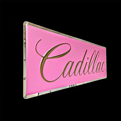 embossed mirror polished stainless steel sign Cadillac script side view